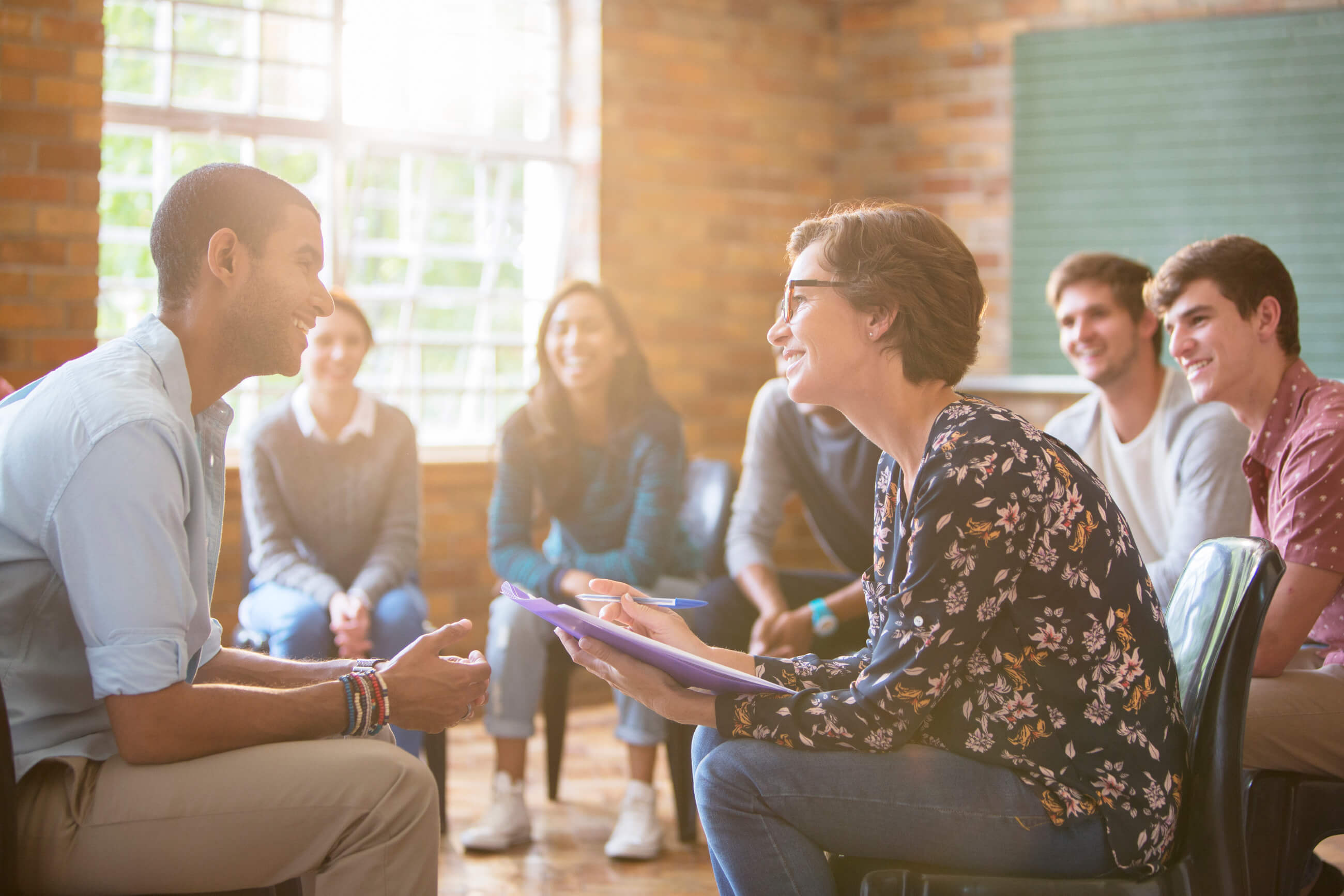 Diverse group of students discussing